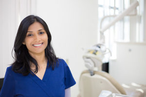 about lovett dental pearland, dentist smiling