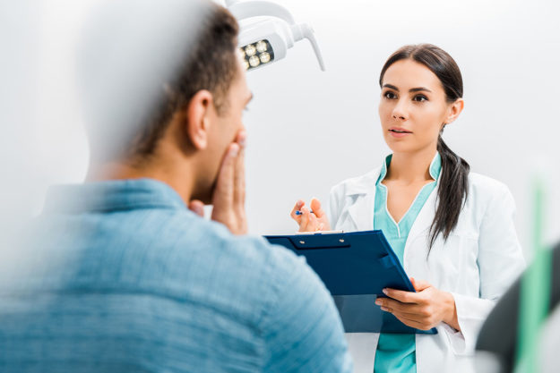 do I need oral surgery patient asking dentist do I need oral surgery