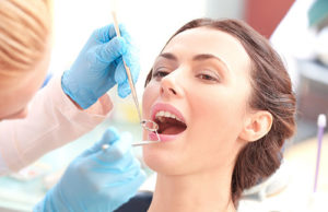 woman getting periodontics pearland tx