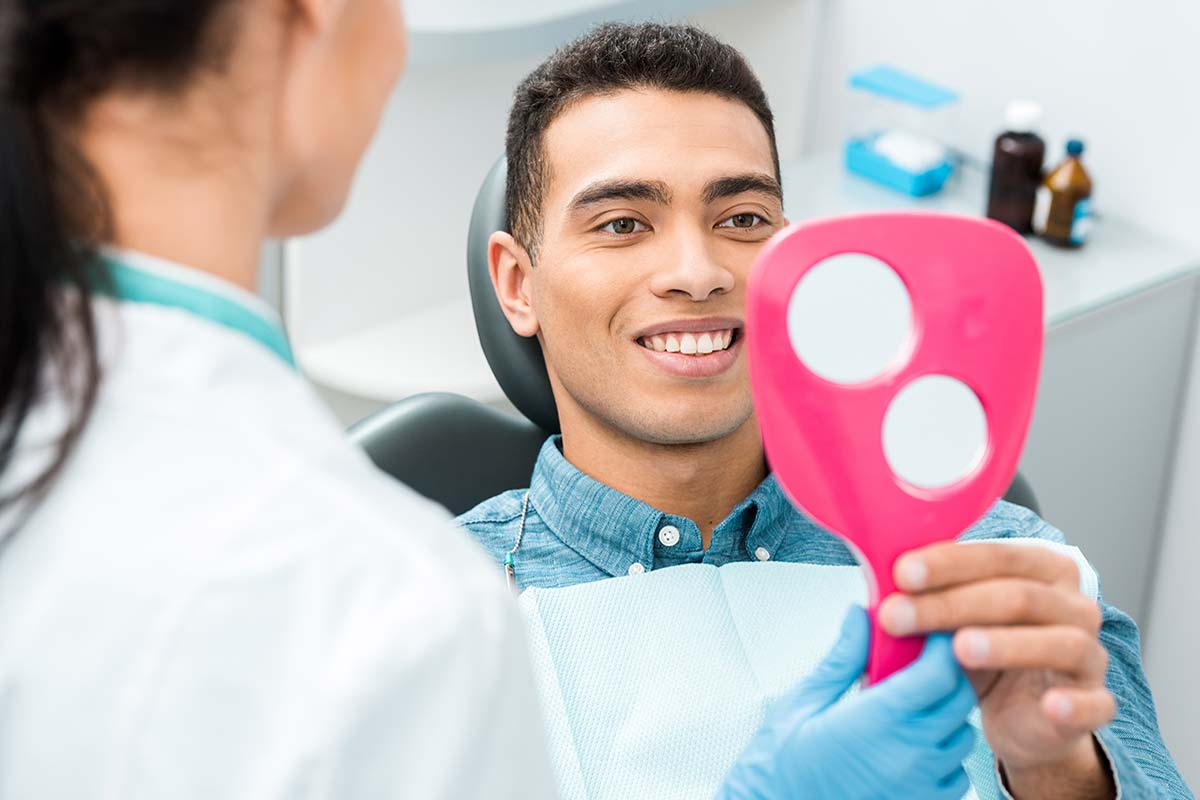a patient looking at same day teeth