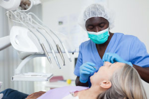 a woman undergoing Tooth Extraction
