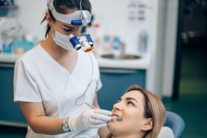 a woman getting a Tooth Extraction