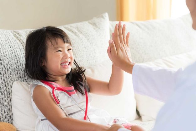 2-How-to-Choose-a-Pediatric-Dental-Office (1) child and parent high-fiving after finding a pediatric dental office