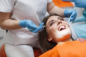 woman gets specialist dentistry services